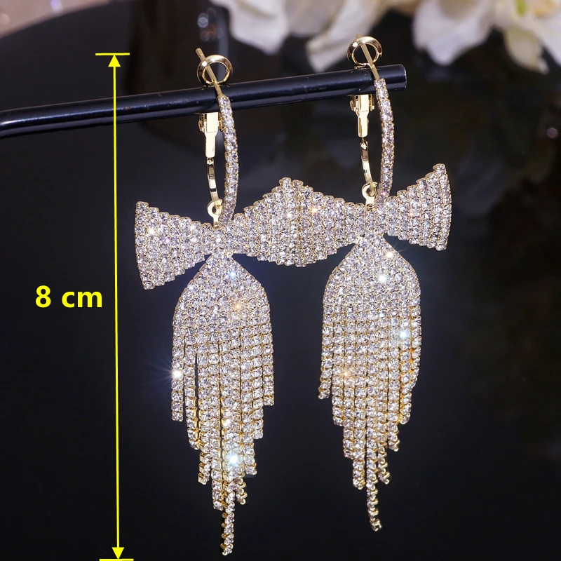 Женские серьги-подвески с бантом