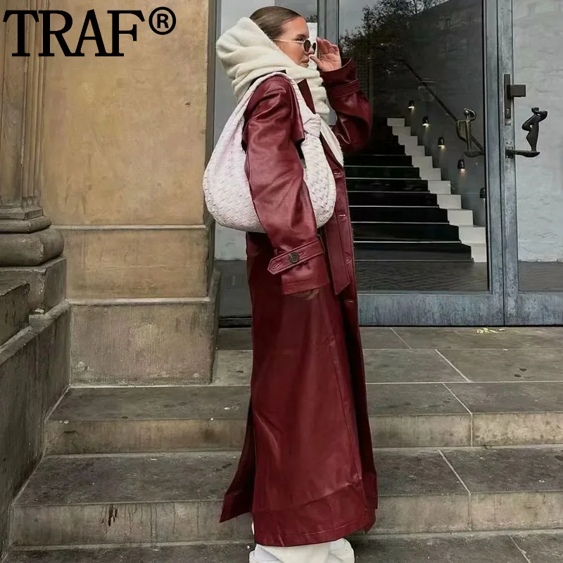 Длинный женский тренчкот из искусственной кожи с поясом на осень и зиму