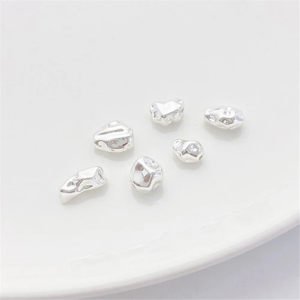 Толстые посеребренные бусины неправильной формы рассыпчатые ручной работы