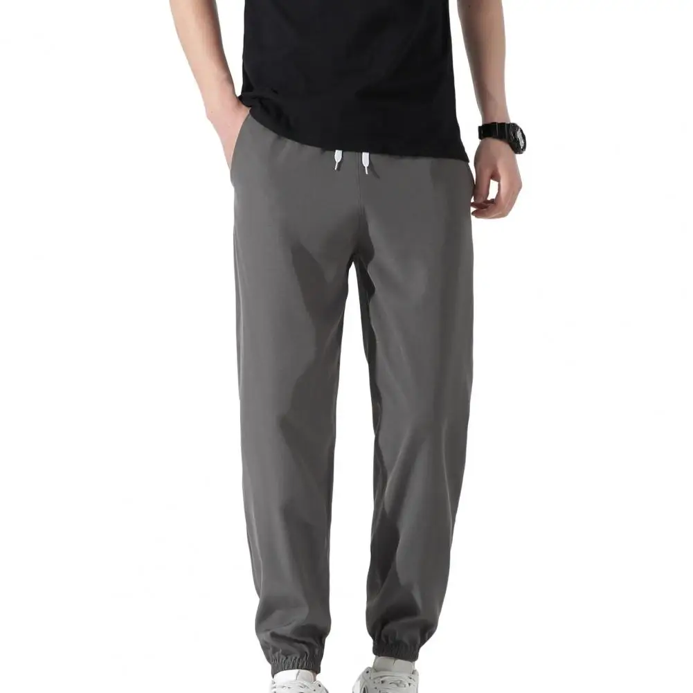 

Breathable Popular Mid Waist Pockets Pants Streetwear Men Pants Solid Color for School