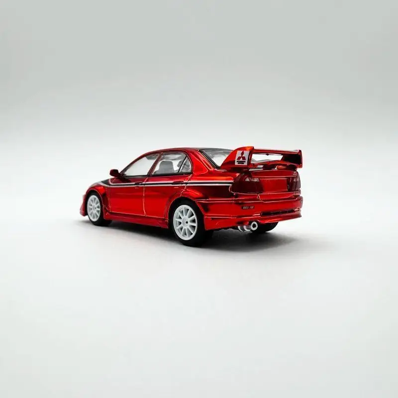 Фото XCARTOYS в наличии: Коллекционная модель автомобиля Mitsubishi EVO в масштабе 1:64, лимитированная серия Beijing Show, красный цвет с гальваническим покрытием, литой сплав. №5