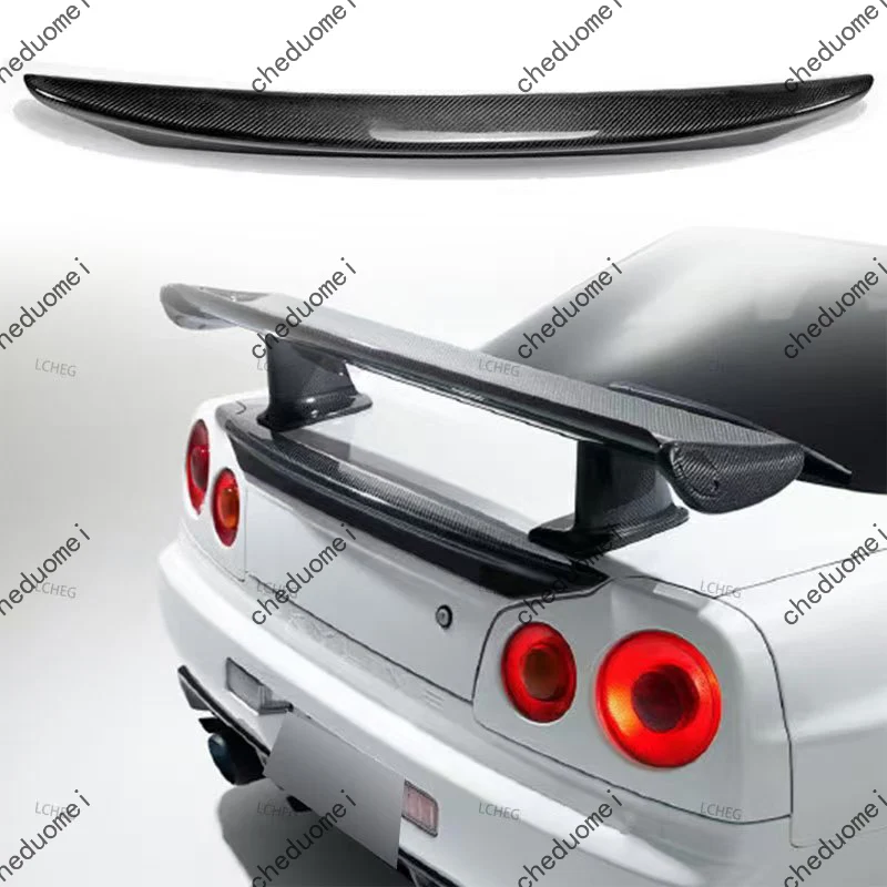 Фото Подходит для Nissan Skyline GTR R34 GTT 1999-2002 годов выпуска. Задний спойлер на крышку багажника из карбона. Аэродинамический элемент для стайлинга автомобиля. №2