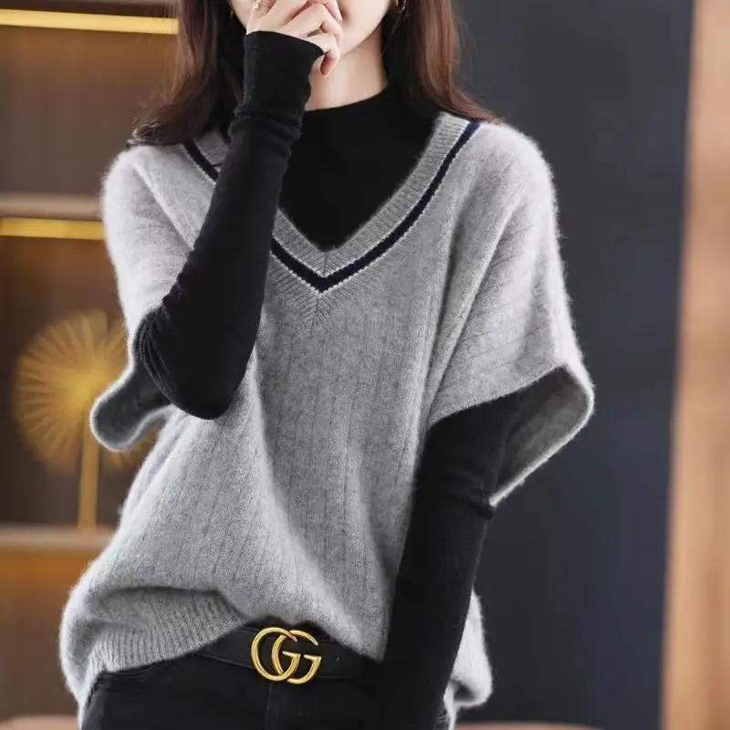 

The new sweater vest female V-neck loose color colored wild vest knitted bottom sleeveless casual sweater vest solid cloths