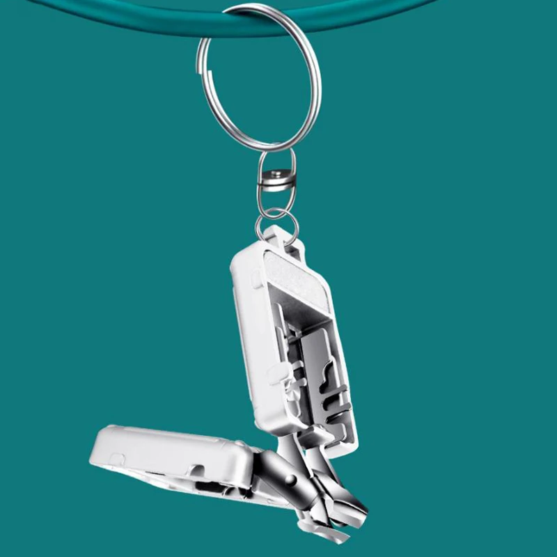 Мини-машинка для стрижки ногтей серебристая стальная складная