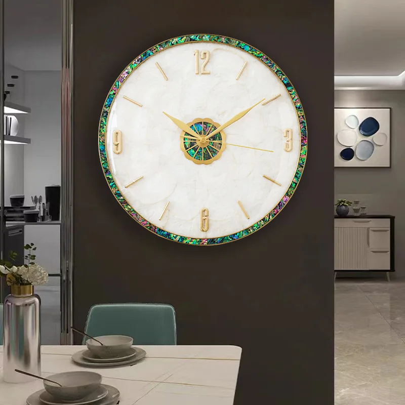 

Light luxury brass shell wall clock living room modern minimalist atmospheric clock home fashion creative automatic clock