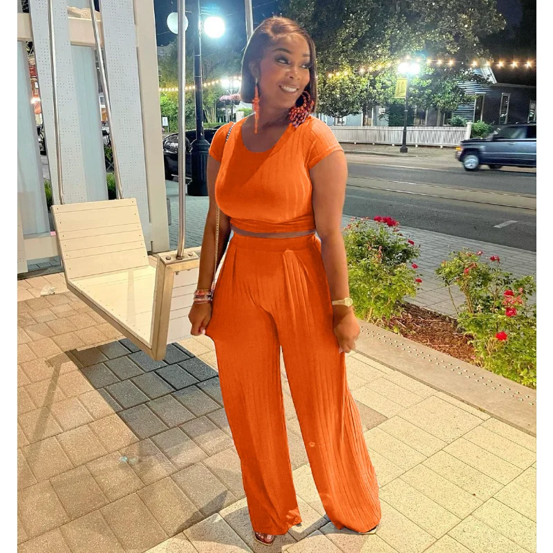 

Ribbed Solid Loose Stretch Casual Two Piece Set for Women Summer O Neck Short Sleeve Crop Top High Waist Pleated Wide Leg Pants