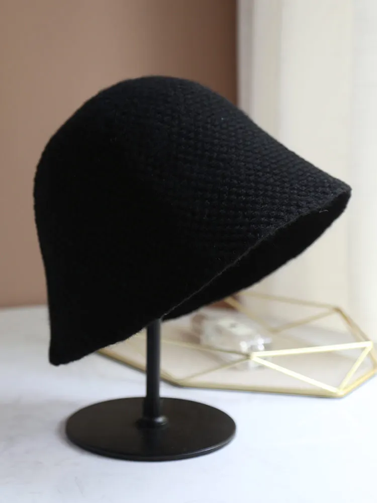

A Wool fisherman hat women's solid color autumn and winter warm knitted hat