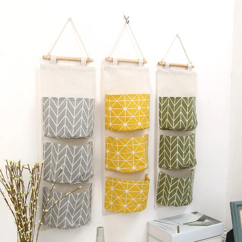 

Hanging waterproof cotton and linen storage hanging bag cloth art three bags hanging bag door sundry storage bag