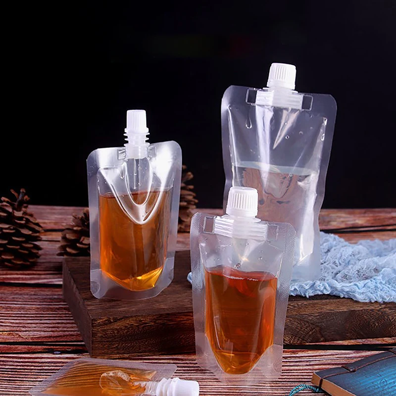 10pcs 30/50/100ml Clamshell Packaging Bag Stand Up Spout Plastic Pouch Beverage Juice Sachets Shampoo Sachets Bottles Organizer