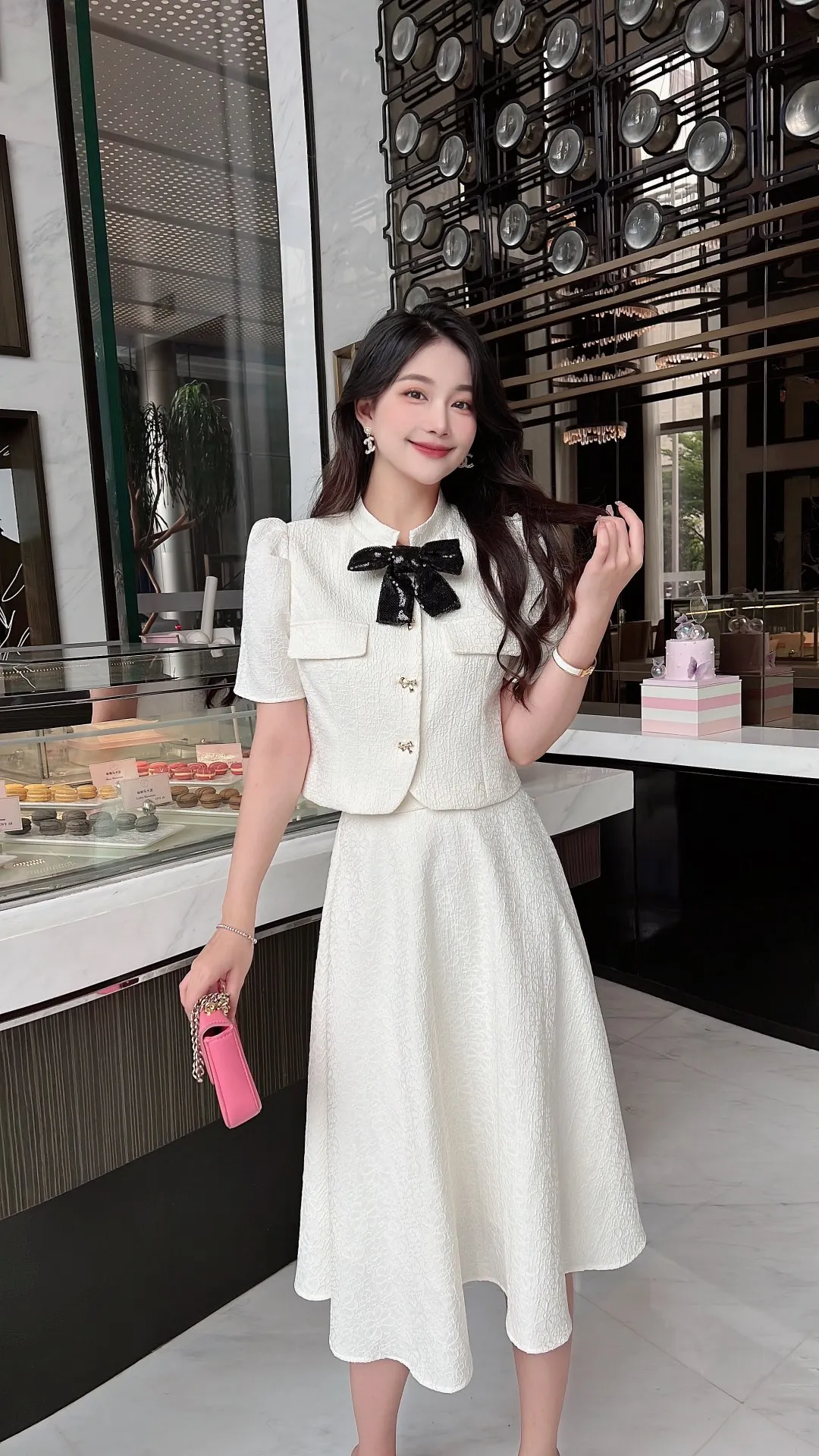 

2023 spring and summer women's clothing fashion new Bow Puff Sleeve Top➕High Waist Mid-Length Skirt Suit 0511