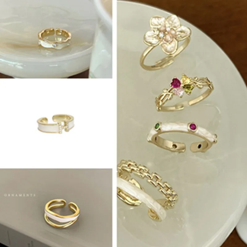 

Pearl ring female white drop oil niche design High fashion personality adjustable fritillaria retro all-match ring burst