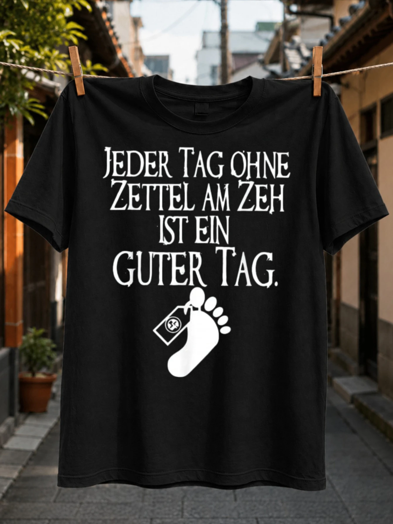 Фото Футболка German Toe Tag с надписью Jeder Tag Ohne Zettel Am Zeh Ist Ein Guter Tag, темная, с графическим принтом, унисекс, для всех. №1