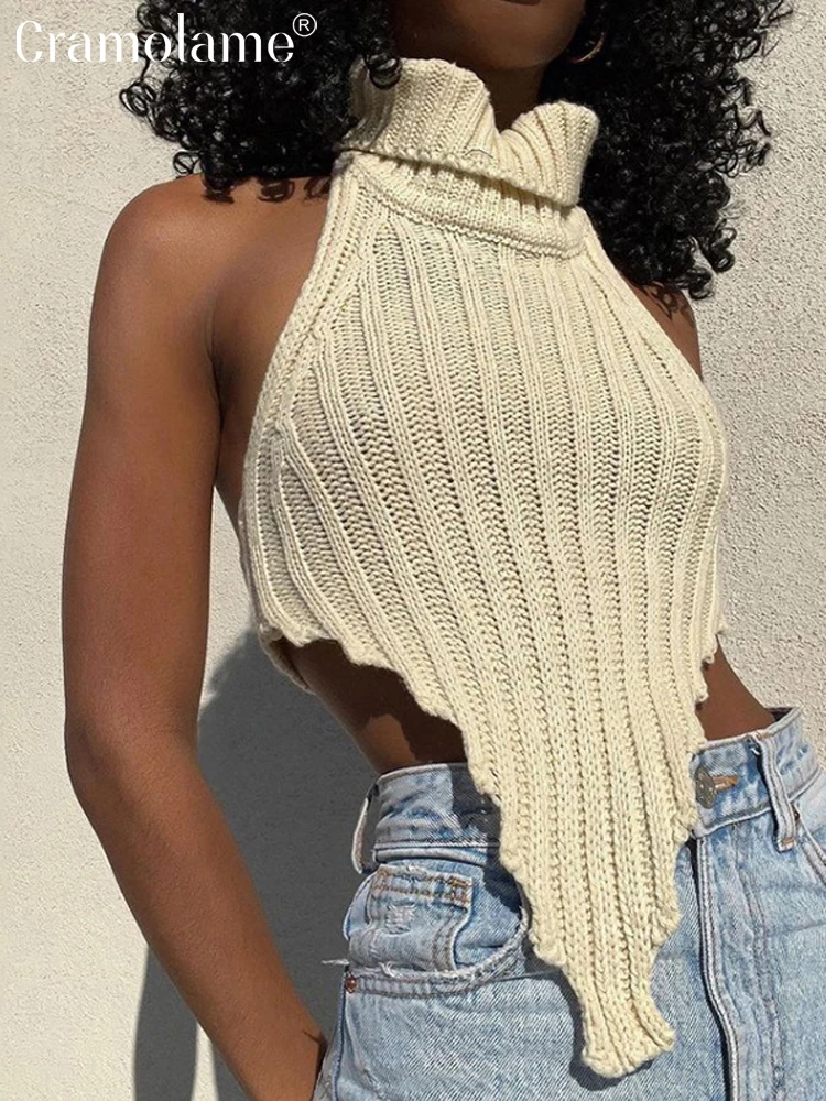 

Женский ТРИКОТАЖНЫЙ УКОРОЧЕННЫЙ ТОП с высоким воротником и открытой спиной