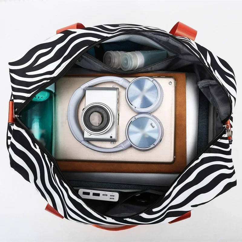 Рисунок 6 - Женская дорожная сумка с леопардовым