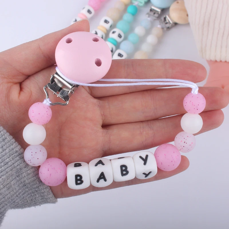 

Personalized Name Chew Silicone Beads Bling Bling Soft Baby Pacifier Clip Chain Plastic or Wood Pacifier Clips
