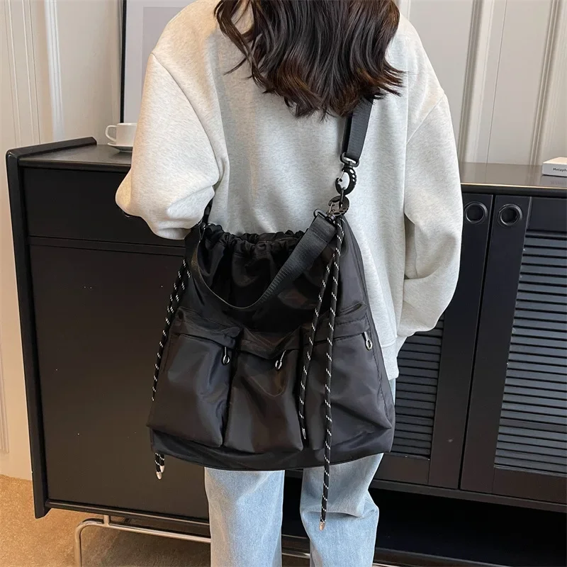 

Large Black Nylon Unisex Crossbody Bag Multi-pocket Totes String Design Travel Shoulder Bags for Women Fashion Handbags Purses