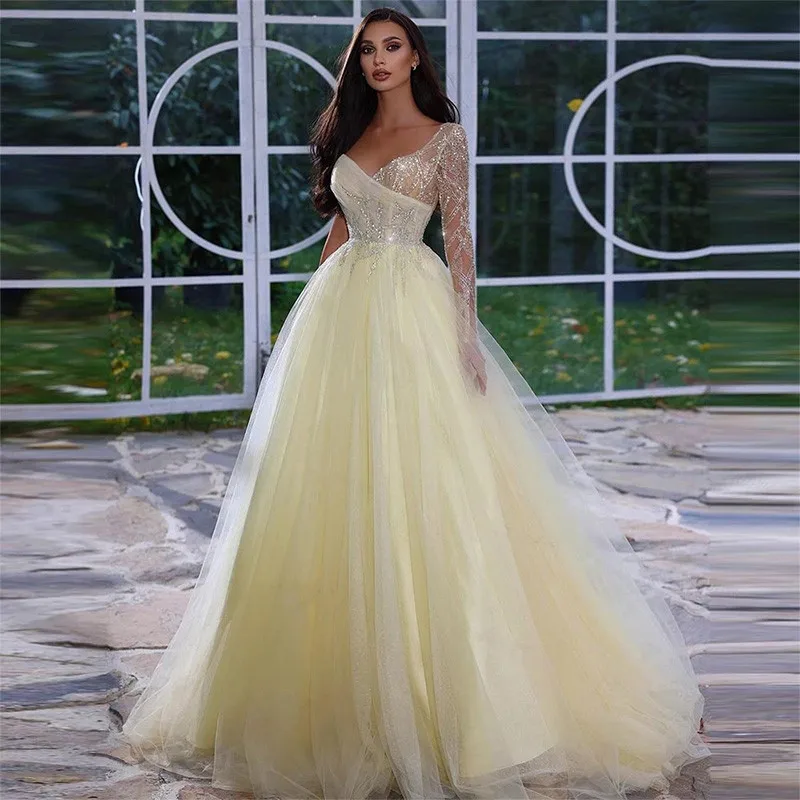 

Light yellow long sleeve beaded evening dress V-neck tulle prom dress Dubai Arabian puffy wedding birthday dress New Muslim form