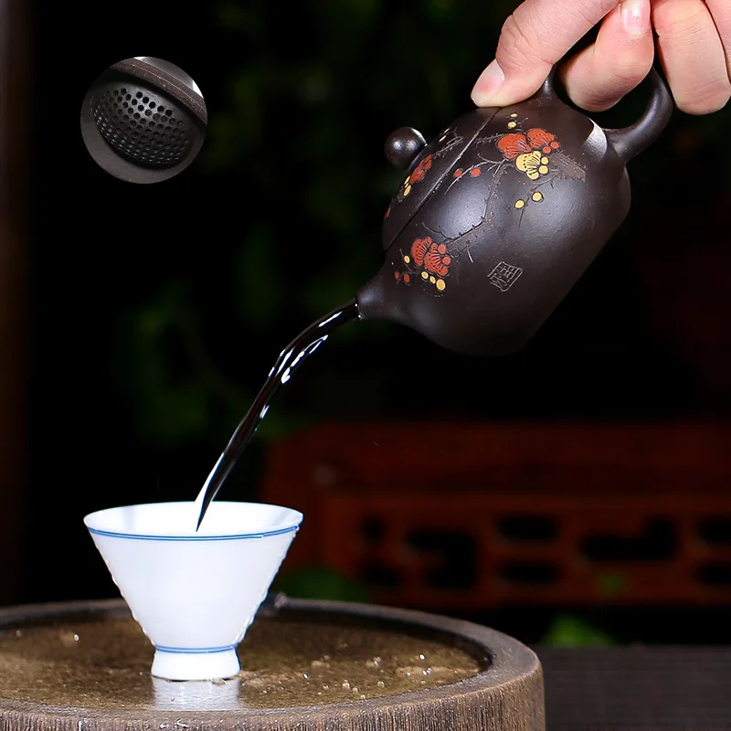 

tea pot with ball shaped infuser holes original ore real yixing zisha black galaxy clay xishi pot marked hand carved wintersweet