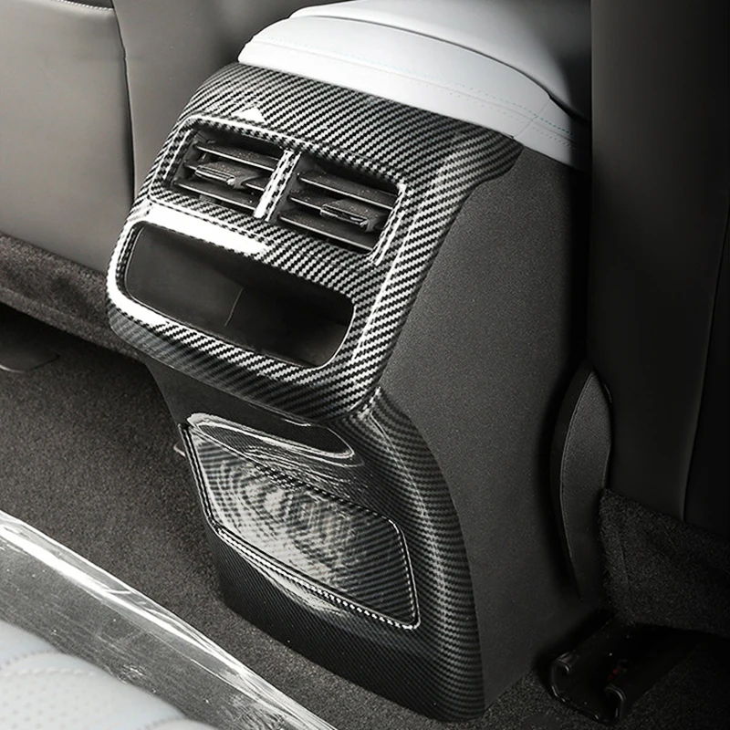 Фото Накладки из АБС-пластика под карбон для BYD Seal EV 2023-2026: накладки на дефлекторы кондиционера, руль, зеркала заднего вида, подлокотник, панель, дверные ручки №4
