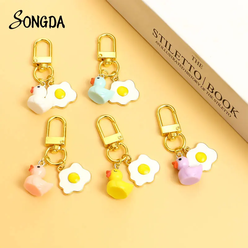 

Cute Little Yellow Duck Resin Pendant Keychain Enamel Cartoon Poached Egg Keyring Purse Bag Car Airpods Box Key Accessories Gift