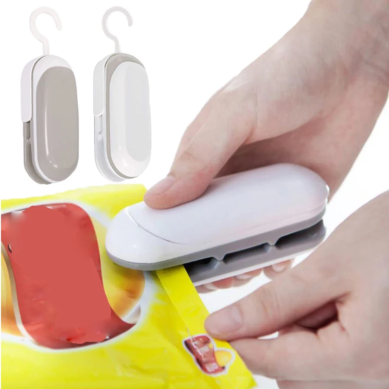 

Kitchen Accessories Mini Sealing Machine Portable Heat Sealer Plastic Package Storage Bag Handy Sticker and Seals for Food Snack