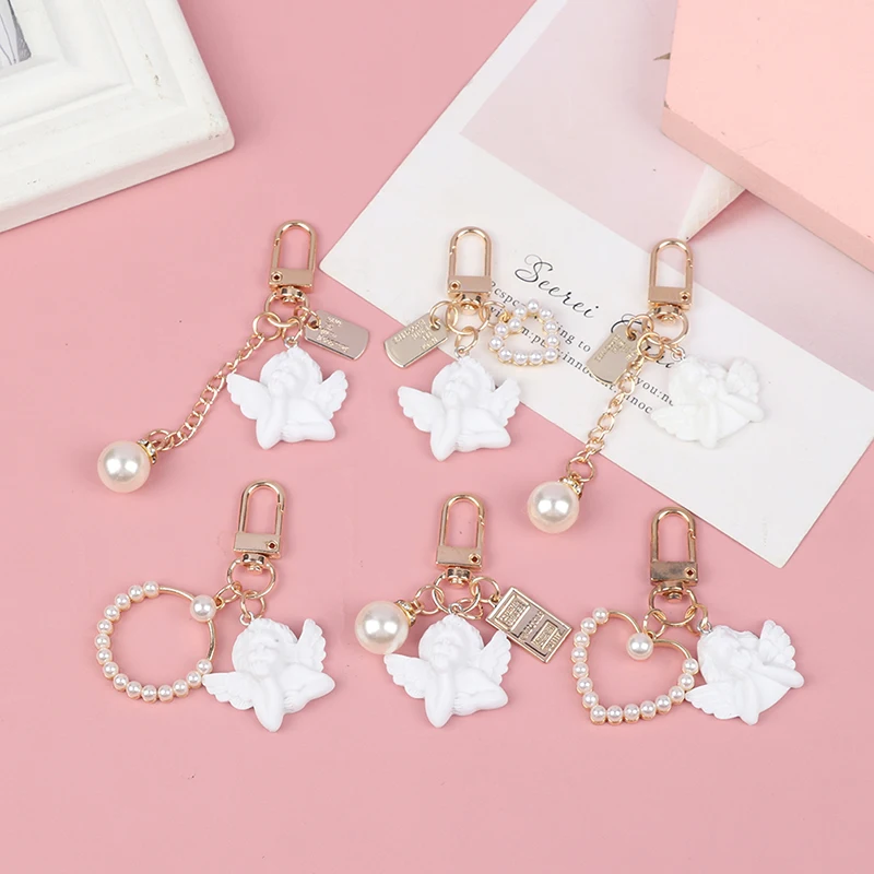 

Creative Vintage White Angel Keychain Women Girl Cute Mini Pearl Heart Key Chain Car Key Ring Holder Trinket Bag Charms Jewelry