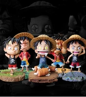 about 15cmone piece childhood monkey d luffy star eye lying unhappy swollen face luffy model hand made gift for birthday