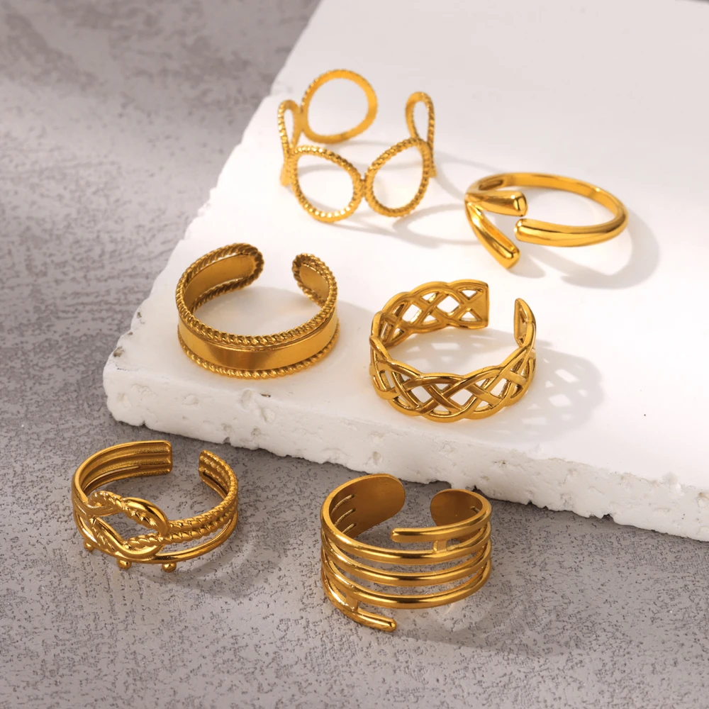 Женское асимметричное кольцо из нержавеющей стали золотистое открытое круглое с