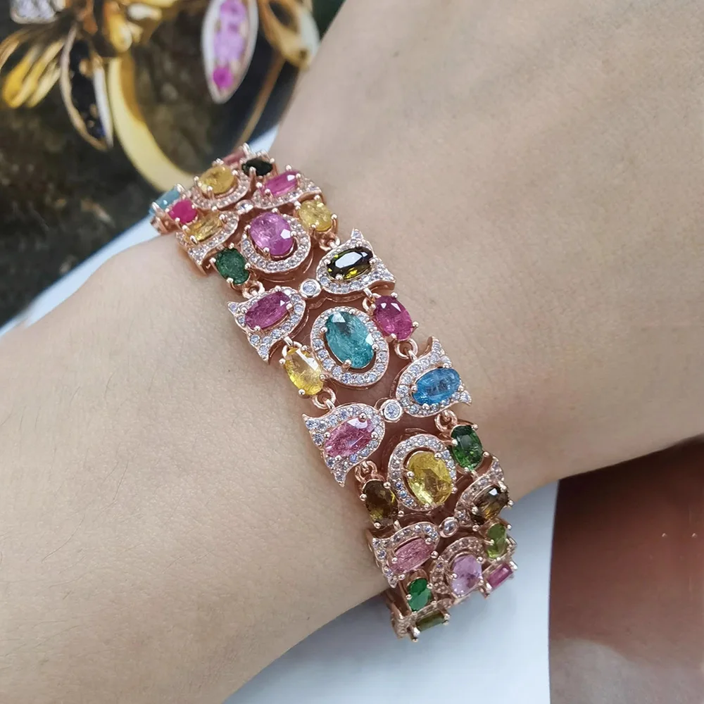 

Женский браслет из розового золота и серебра, с разноцветными фианитами