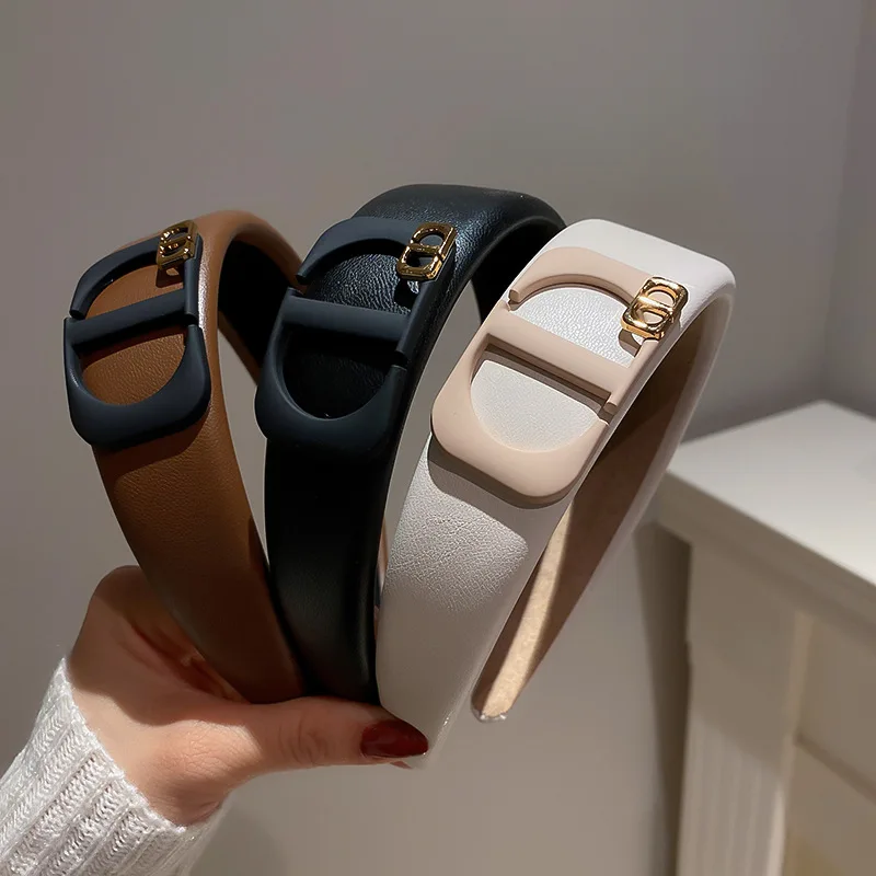 

Korean Original Design Retro Simple Plain Color Wide Edge Pressure Fashion Personality Versatile Letter Leather Hair Band