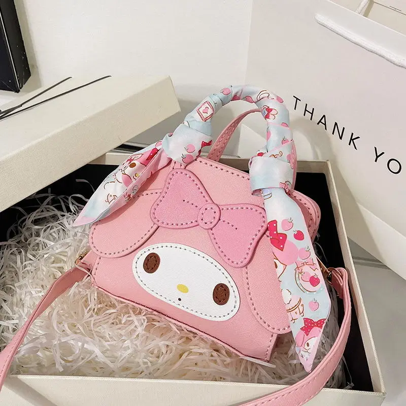 

Женская сумка через плечо с мультяшным рисунком