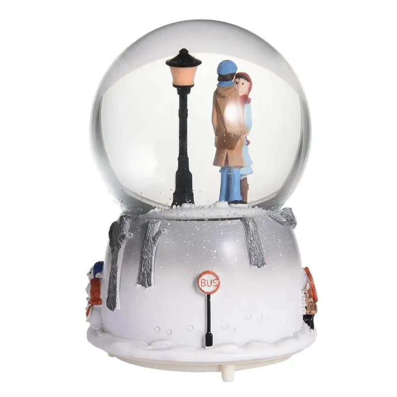 

High-quality Castle In The Sky Music Crystal Ball Automatic Snowflake Spray Beautiful Couple Snow Globe For Gifts