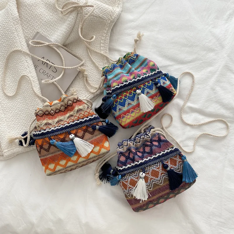

2022 New Fashion Travel Ethnic Style Women Embroidered Cotton Linen Drawstring Bucket Tassel Contrast Color Shoulder Small Bag