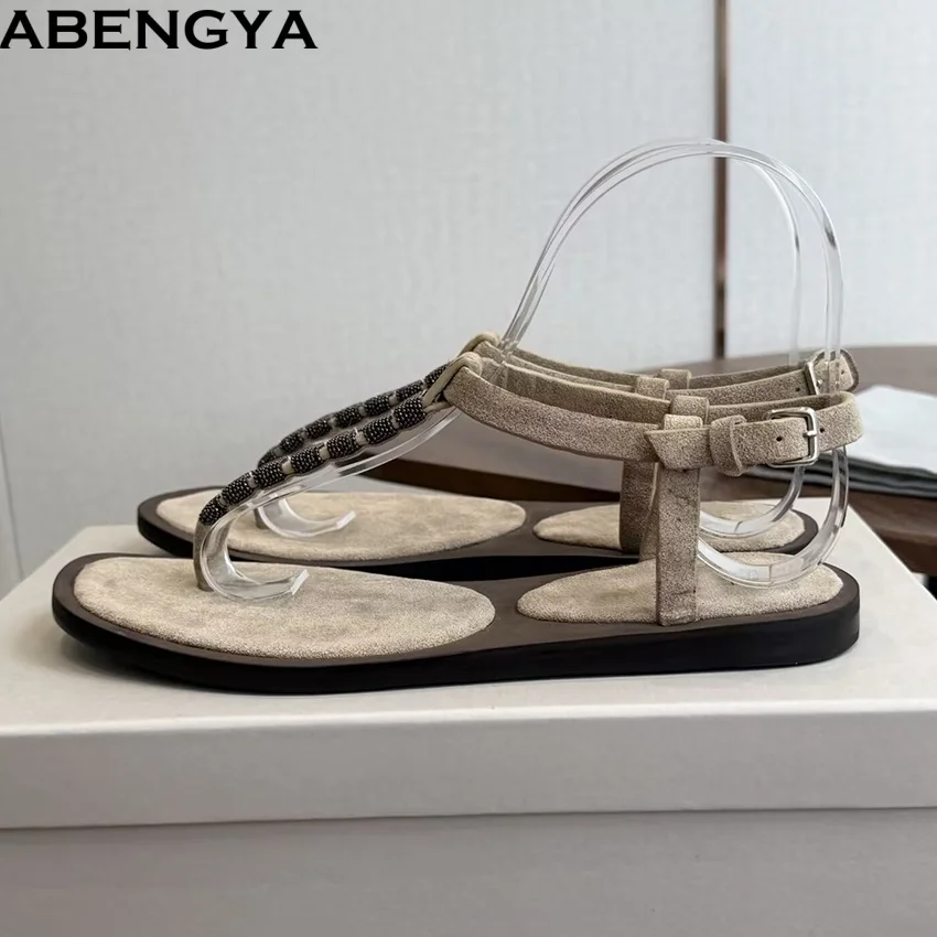 Фото Женские замшевые шлепанцы ABENGYA, плоские сандалии с бусинами, пляжная обувь для отпуска, повседневные туфли, сандалии для женщин №1