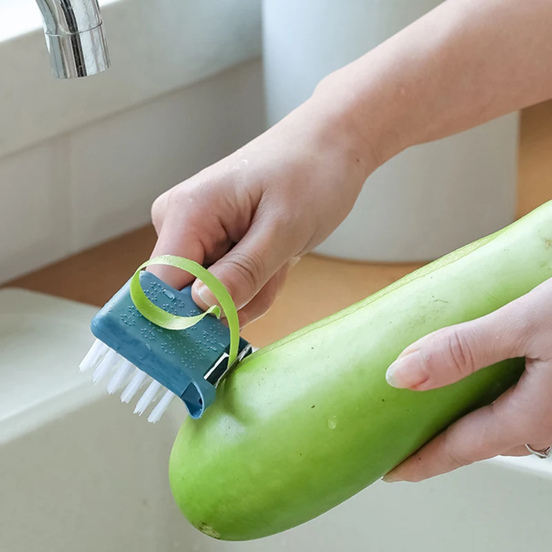 

Five-in-one Multi-function Household Peeler with Cleaning Brush Peeling Knife Grinding Garlic Bottle Cap Kitchen Gadget