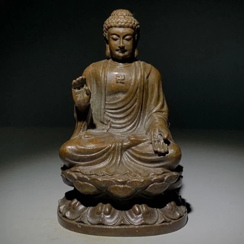 

Статуэтка Будды из меди