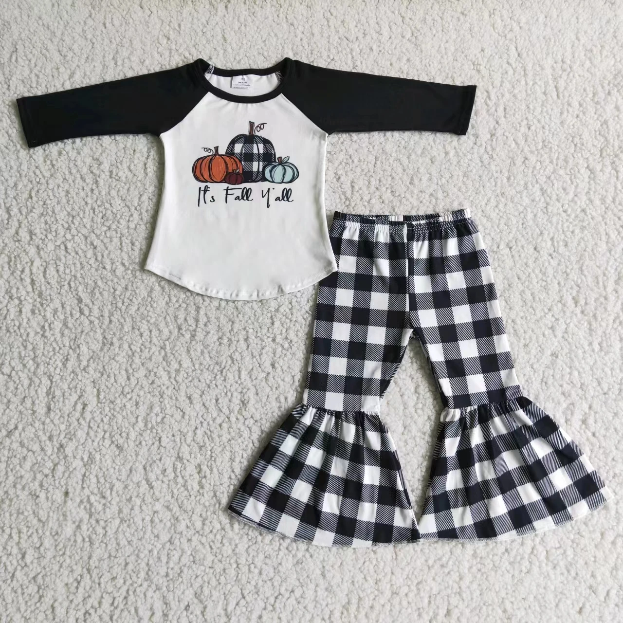 

black long sleeve raglan white pumpkin print top t shirt and black white plaid bell bottom pant winter autumn children clothing