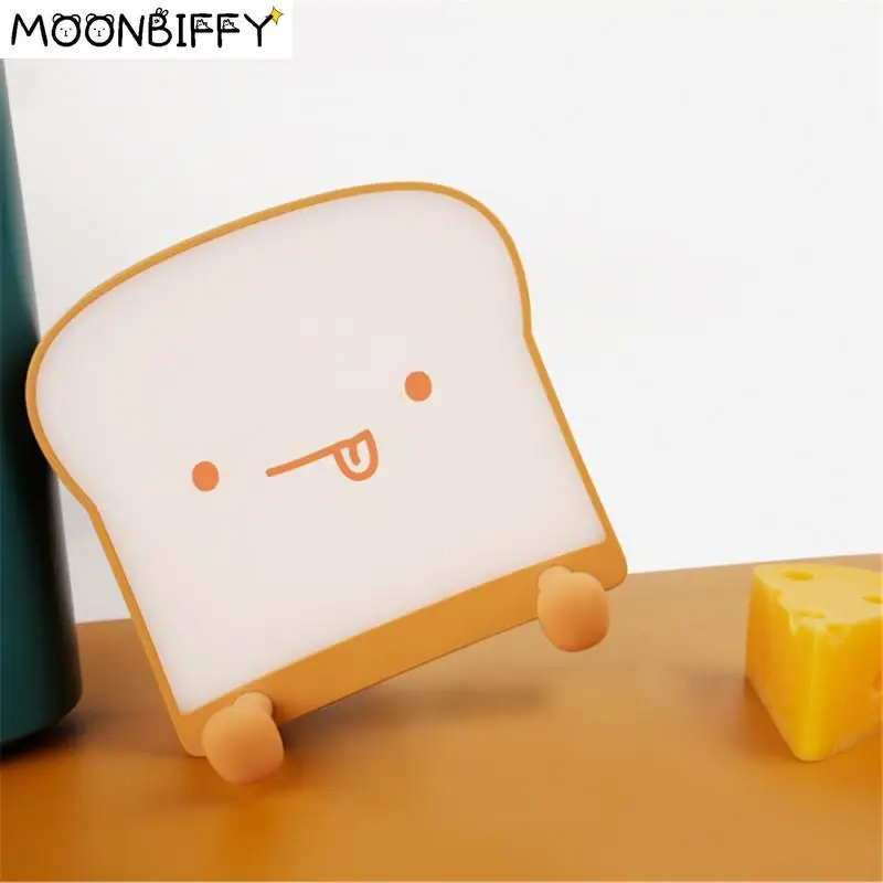 

Cute Night Light Cartoon Toast Bread Led Lamp Mobile Phone Holder Bedroom Bedside Silicone USB Atmosphere Light Birthday Gifts