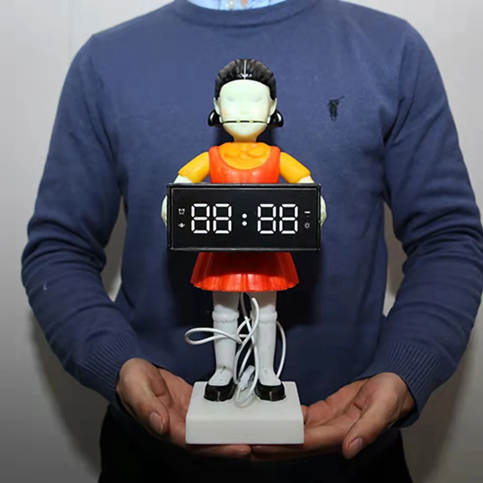 

Новинка, будильник для игры кальмар, стреляющие пули, чтобы разбудить вас, кукла с крассветильник, зеленым светильник Том, часы для игры в ка...