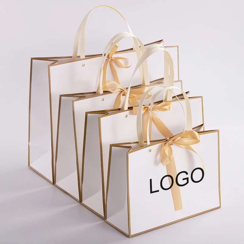 

10pcs Custom Logo High-Quality Rivet Paper Bag Bow Tie Gifts Clothing Shipping Bag With Handle Large Size Gold Ribbon Bag