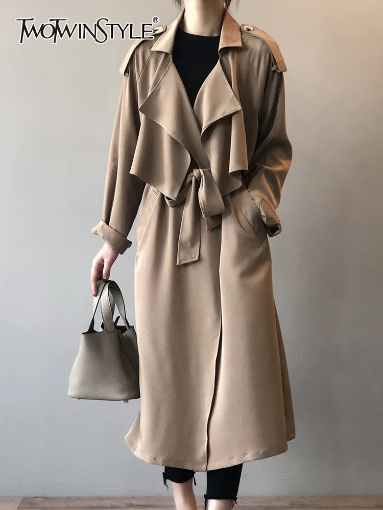 

TWOTWINSTYLE Solid Spliced Lace Up Trenches For Women Lapel Long Sleeve Patchwork Pockets Vintage Trench Female Fashion Clothing