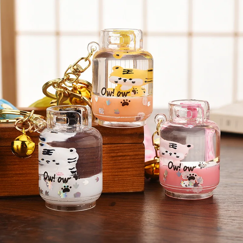 

Креативный милый Бензобак с маленьким тигром, оригинальный подарок для девочки, брелок с плавающим тигровым следом, блестками и сумкой для ...