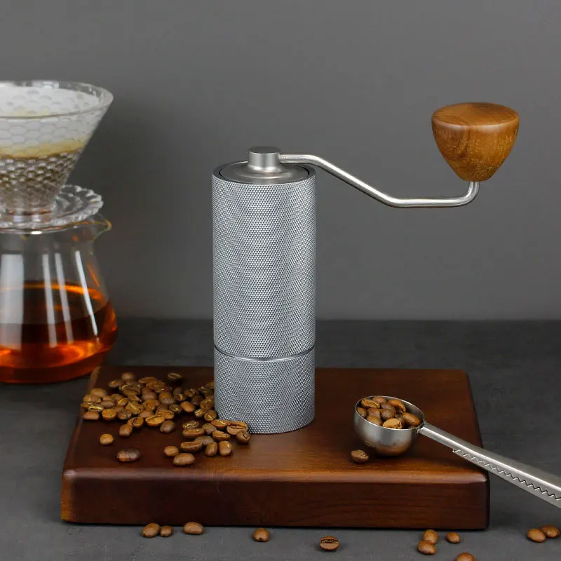 

Portable Aluminum Manual Coffee Grinder High Quality C2 Stainless Steel Mini Burr Adjustable Mill And Double Bearing Positioning