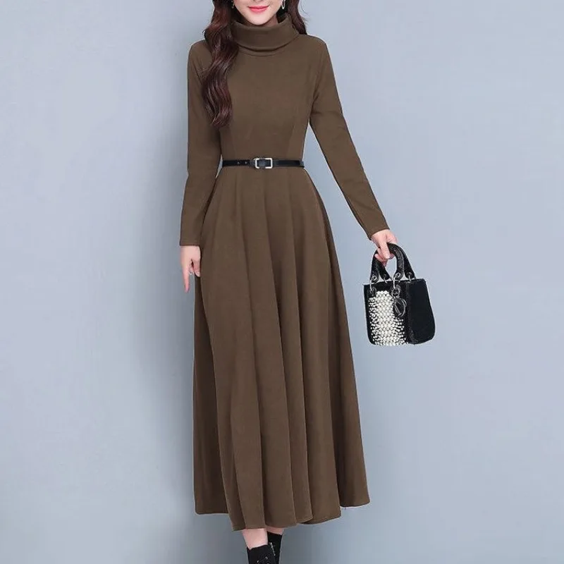 Женский осенне-зимний пуловер с высоким воротником и поясом оборками