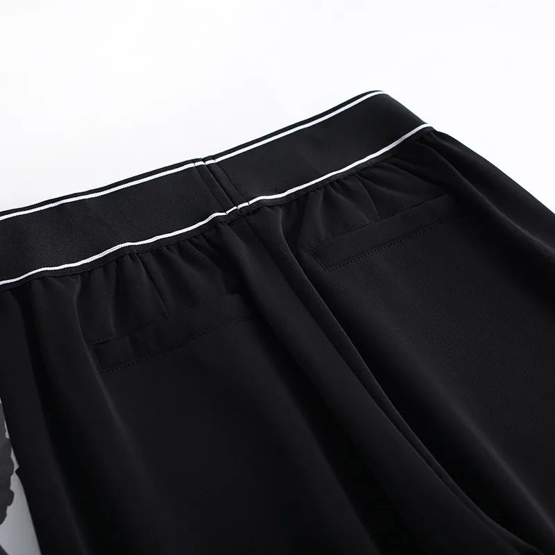 Брюки женские в рубчик с эластичным поясом и широкими штанинами свободные тонкие