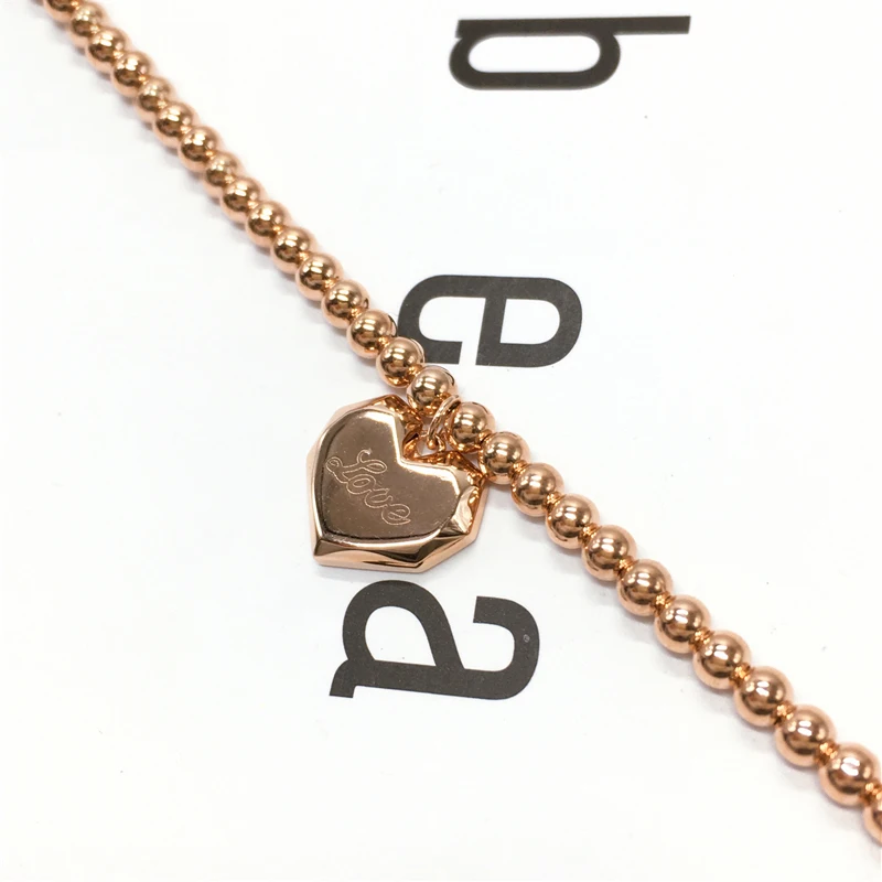 Женский браслет из розового золота 585 пробы с круглыми бусинами