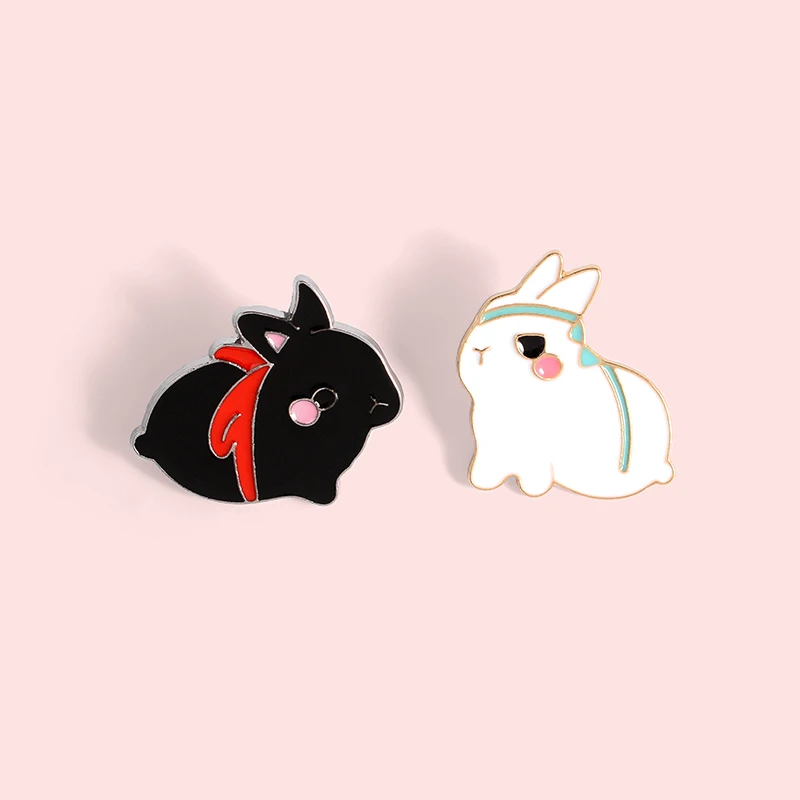 

The Untamed Enamel Lapel Pins Brooches 2 White Black Rabbits Tassel Bag Cloth Button Badge Jewelry Fans Gifts