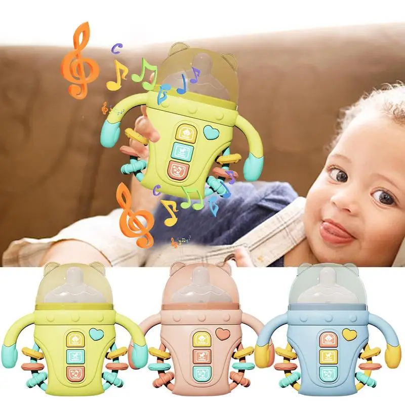 

Babies Soft Rattles Shaker Feeding Bottle Hand Rattles Toys With Sound Shower Gifts For Girls Boys Shaker & Teether Toys For 3 6