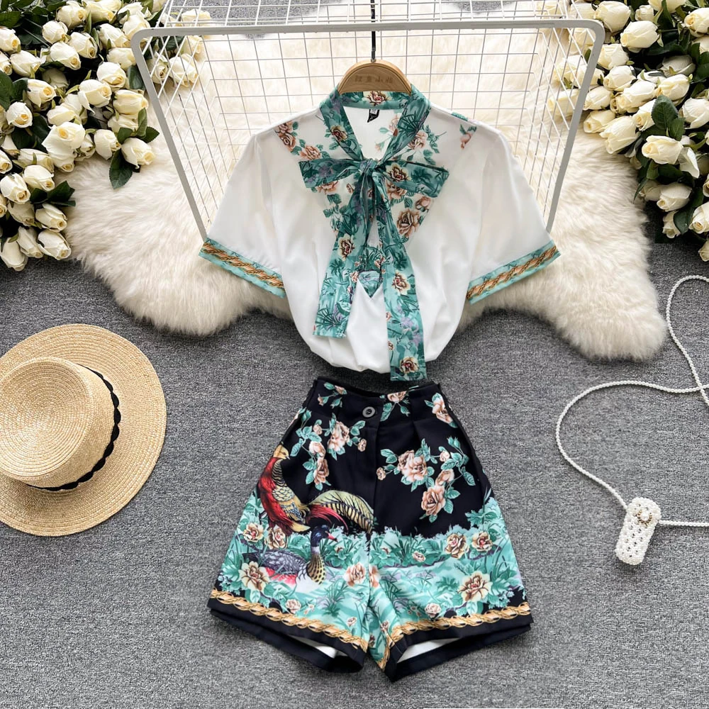 

Summer New Fashion Women Ribbon Collar Bow Loose Short Sleeve Shirt + Wide Leg Printed Shorts Two-piece Sets G042