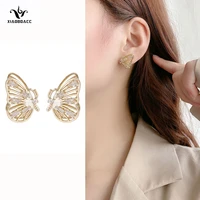 xiaoboacc 925 silver needle butterfly earrings for women korean fashion hollow pearl stud earring 2022 new trend jewelry